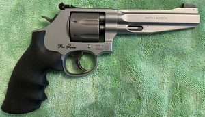 This Performance Center Pro Series 986 Revolver has fired few rounds. All light target loads. It has been recently serviced and refinished by Smith & Wesson's A