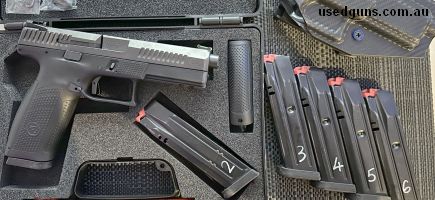 Comes with 6 CZ mags, custom Legacy Firearms holster, green fiber optic front sight, metal trigger, original hard case and original parts. The magazines alone r
