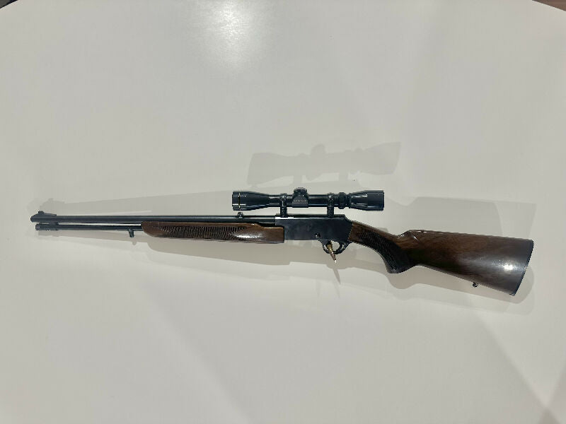 Browning pump action 22WMR. Made in Japan. Topped with Leopold VX1 2-7x33.