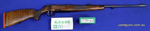 Timber Stock, blue barrel, 3 shot detachable magazine,RCBS dies,100 RWS new brass,