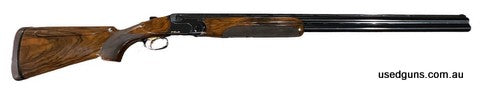 Beretta DT10 Trident Trap left hand. 30 inch barrels with fixed chokes (improved modified and full). adjustable stock with small marks on timber. In good condit