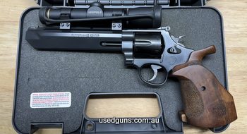 Performance Centre 629-6 would be excellent aside from minor marks on the cylinder from use. Super accurate with minimal use. Trigger and action have been gunsm