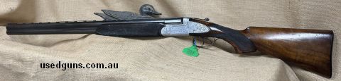 #24/514 Made in Italy, Double Trigger, Not Ejectors, English Steel Vickers-Works=Sheffield. Barrel has bluing rubbed off in places. Gun seems to have been looke