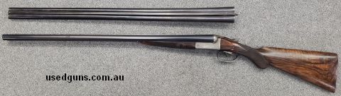 Charles Boswell London Field Hammerless SxS 12 Gauge Shotgun. LEFT HANDED cast. Extractors. Double Trigger. Comes cased (leather) with 2 barrel sets. Original B
