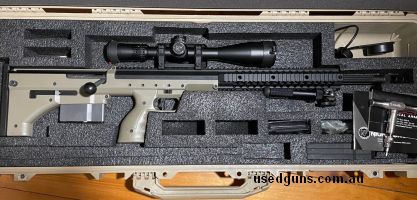 Fired less than 100 rounds. Admired it more than I shot it. Bought new. Unmarked. No scratches. One DTA mag. Comes with DTA muzzle brake, DTA toolkit, DTA SRS P