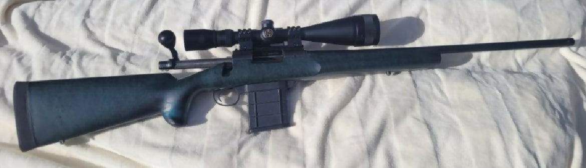Remington 260, Rem 700 action , after market target trigger ( no safety ), bell and Carlson stock, after market bolt handle , 10 shot DBM kit , Simmons white ta