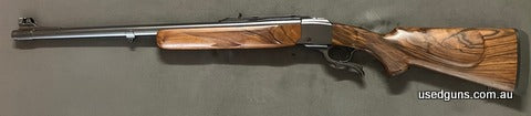 Custom built gun in a hard hitting caliber. Very well put together and with gorgeous wood. Postage to your dealer will be $150.