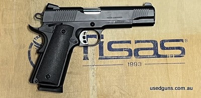In excellent condition. This unfired ex demo pistol comes in its factory box with 2 x 10 round magazines. With fixed sights, extended beaver tail and skeletonis