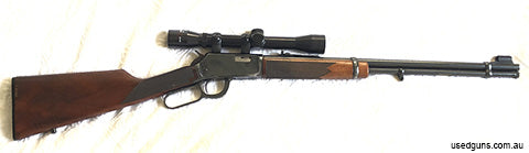 Rear Winchester MODEL 9422 XTR - .22 S-L-L.R. Made in New Haven, Conn. U.S.A. It comes with TASCO Japanese 4x32 Scope. Rifle and Scope is in GOOD condition and 