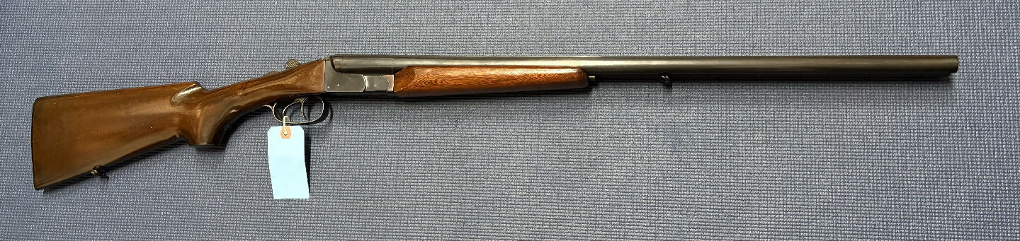 Safari firearms Sale! Rossi SxS 12G Shotgun in very good condition. Locks up tight. Nice dark woodwork. Retains a gloss finish.