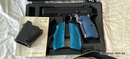 Come with ever thing in photo LOK grips and originals 5 mags and holders 2 holsters cleaning kit bag case belt eze loader shell pouch trigger lock