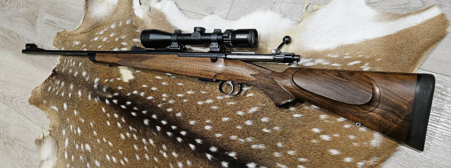 HUSQVARNA 1640 30-06 with custom hatcher stock. Excellent condition like new. Comes with talley scope rings and vixen 3-12x40 scope. The whole package with scop