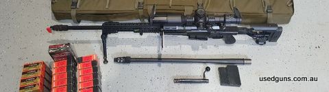 Accuracy International AXMC. Stock and barrels like new. Hensoldt scope - ZF 3.5-26x56 FF, with flip up dust covers. 338 Lapua Mag / 300 Win Mag barrels, bolts,