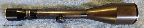 top quality older scope with steel tube 26mm no dents. blue is faded and slight rub marks alloy tube near lenses. lenses are very good crosshair reticule . text