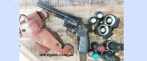 Included is a vintage, lined leather, open-front holster. 8x speed loaders and 2x leather holders