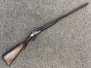 AMERICAN GUN CO
SIDE X SIDE
16 GAUGE
27.5 INCH BARRELS
WITH EXPOSED HAMMERS
CHECKERED TIMBER STOCK
AND FOREND
CLEARLY MARKED ON RECEIVER 
"AMERICAN GUN CO NEW YORK" 
#376800

EXC $690