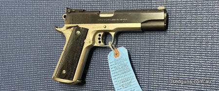 Very good condition Colt Special Combat in 38 Super. Two Tone. 5 inch barrel. Barrel excellent. Cycles smooth. Trigger crisp. Adjustable rear sight