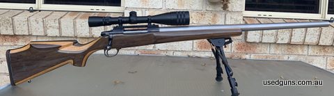 Sako 7mm Remington Magnum A3 Action, crisp tuned trigger (1 pound). Maddco heavy varmint barrel, custom laminated walnut & oak beaver tail varmint stock. Shoots