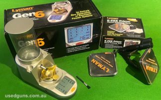Lyman Gen 6 digital powder scale and Lyman Ezze-prime tool. Both in good condition with original boxes and paper work. Powder Scale measures to .1gr. Prime tool