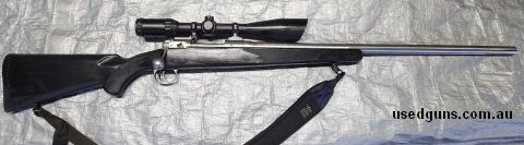 Tack driver  sitting in safe too much.  need gone to fund new project,  heavy barrel, accutrigger, stainless finish, internal magazine .