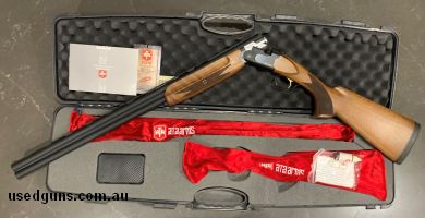 Beautiful gun, has only has 2 boxes of shells fired. It is as new, with the original hard case, manual and chokes. Has always been stored in a gun sock in a saf
