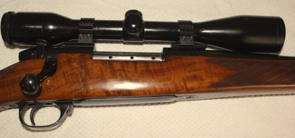 Weatherby 257 WM in very good to excellent condition, metal edges on bolt fluting and locking lugs are razor sharp, bolt face is unpitted, no damage to metal wo