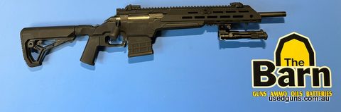 Ruger American Ranch 223 in an MDT ESS Chassis. Has a 16.5 threaded barrel. Is decked out with a full length pic rail, embust sights, pistol grip, 10rnd MDT pol