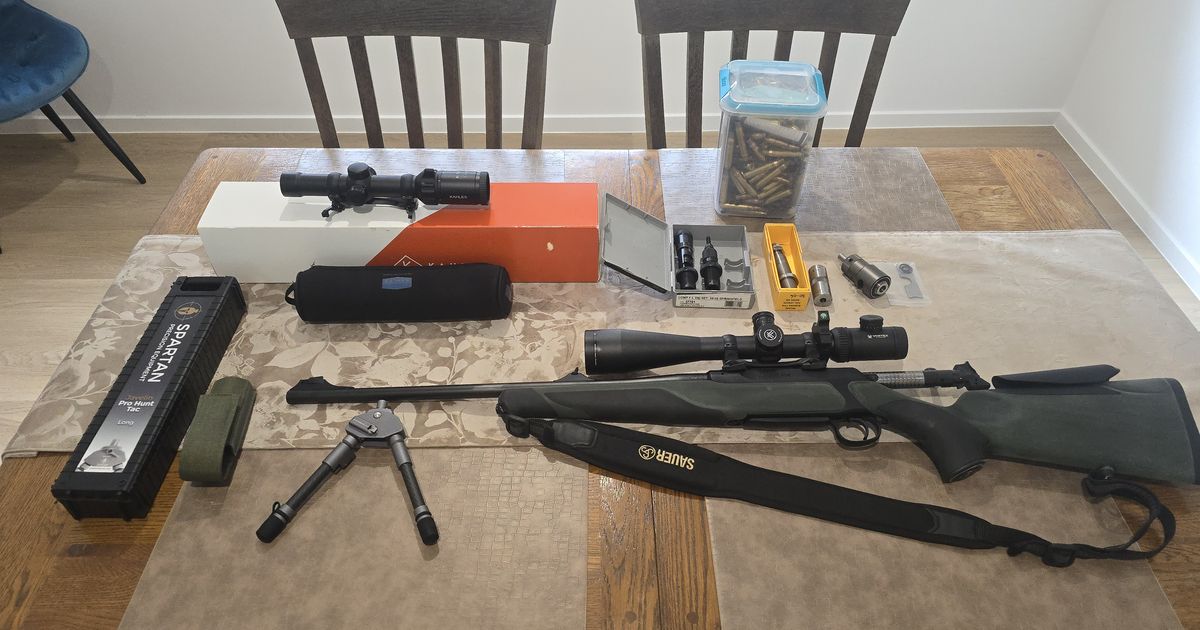 Sauer 404 in 30-06 and two scopes