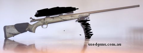 Fluted heavy sporter contour barrel, A-TACS AU (Arid/Urban) camouflage, Cerakote Burnt Bronze finish , threaded muzzle brake, cap and rotary muzzle brake, detac