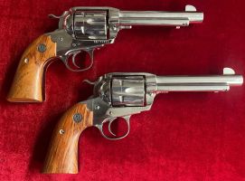 Pair Ruger Vaquero Bisley 44m 5.5" S/Steel revolvers Excellent Plus Condition. Little used Suit new guns buyer