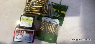 270W reloading components, 48 nosler 140 bt projectiles , 70 Hornady 140 SST projectiles. Remington brass 50 once fired cases, 23 new cases. Post extra