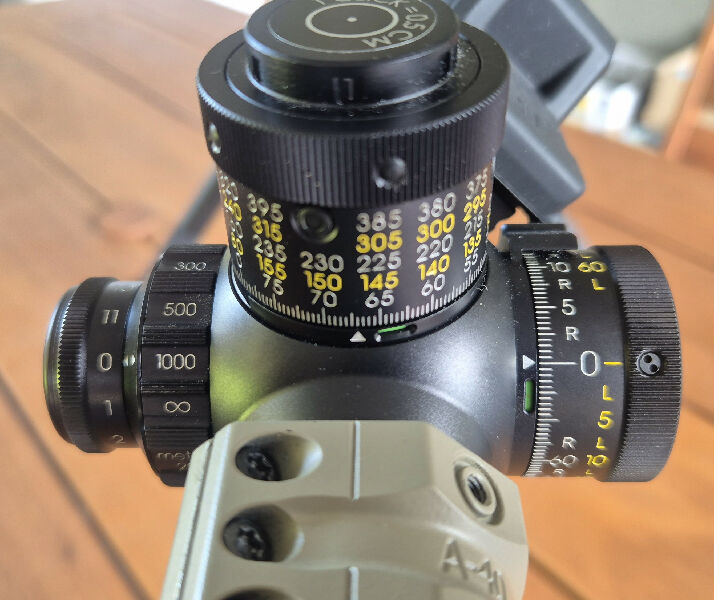 Schmidt and Bender 6-36 MP II High Performance, .5cm multi turn turrets and P5 reticle.