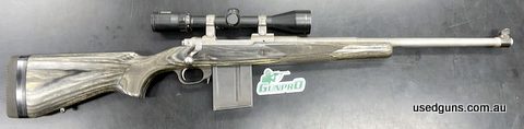 Ruger Scout Grey Laminate Stainless Chambered in 308W. 19 inch barrel, factory 1 inch rings, Bushnell Elite 3-9x40, 10 shot steel magazine. Minor blemishes and 