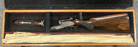 The Holloway & Naughton name has been highly regarded in British gunmaking since the early nineteenth century. This is a fine cased example with good engraving 