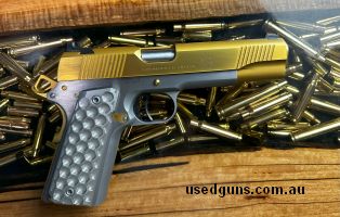 Beautiful 1911,  PVD and TiN Coated, slide job and trigger job performed by Victor precision. this thing is super smooth, honeycomb aluminium grips, have spent 