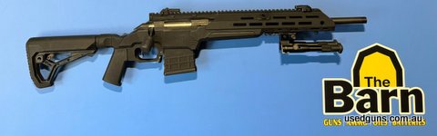Ruger American Ranch 223 in an MDT ESS Chassis. Has a 16.5 threaded barrel. Is decked out with a full length pic rail, embust sights, pistol grip, 10rnd MDT pol