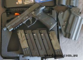 comes with 6 mags and 2 Trex arms holsters.