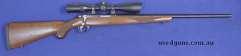 Timber stock, detachable rotary magazine, minor handling mark under side stock.