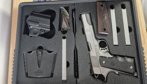 Carry case included along with 5 x stainless mags, cleaning rod, original grips, paddle holster, magazine pouches and sight maintenance kit.