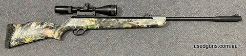 Very good condition Hatsan 125nin 177 Air. Mounted is a Gold Crown Air King 3-9x42. Glass is clear and sharp. Stock has a RealTree camo applied. $65 freight to 