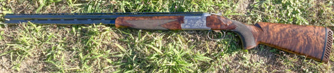 Beautiful Miroku MK 10 Grade 5 sporter shotgun. Has 4 chokes spare gold trigger, briley choke wrench and Miroku gun slip, a couple of very minor marks on stock 
