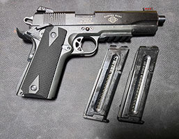 Custom shop 1911. Adjustable sites, picatinny rails, threaded barrel etc. Owned since new. Couple of thousand rounds through it.