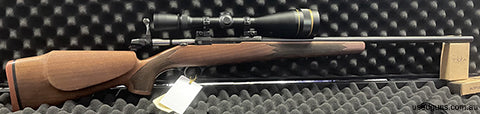 RARE GEM !! A classic Sako M591 Sporter barrel, timber stock in excellent condition, floorplate magazine, optilock rings and bases.