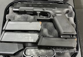 Glock 34 G5 MOS 9mm full size. 10 shot. Comes with three magazines