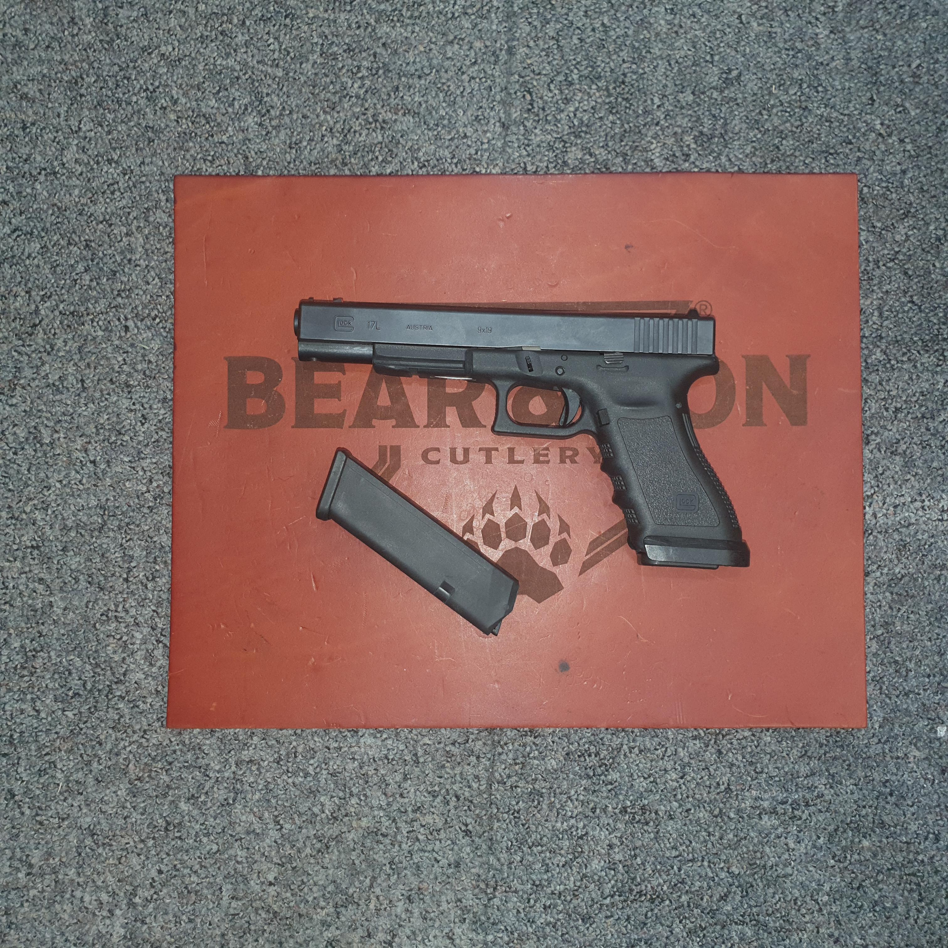Glock 17L 9mm pistol with case and spare mag.