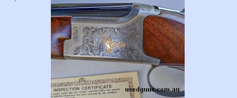Grade 3 timber in very good condition. Good inlays of game birds on sides of receiver. New kick pad. Recently serviced and triggers now set at three and half po