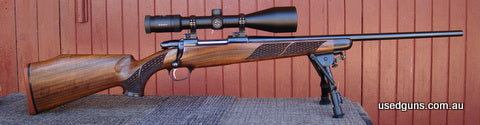 Rifle is new and is from my collection. Comes with 30mm Optilocks and bases. It is fitted with a Zeiss Diavari T classic 3-12x56 which I will sell.