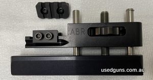 This LSP Adjustable Bag Rider is made in the USA. It is the Picatinny Rail Mount Model with the V Bottom. Included is an ATP 3 slot M-Loc Picatinny Rail. Bought