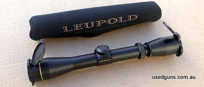 Matte finish, no visible ring marks, duplex reticle, click adjustable turrets, Alumina scope covers. Can't find the box but the neoprene cover included. 2004 mo