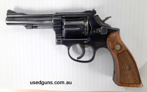 Has a little holster wear but in good condition. Comes with an additional set of Pachmayr grips.